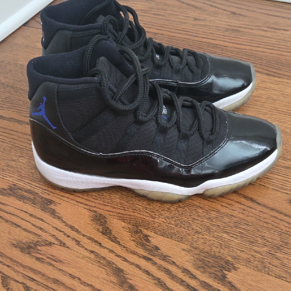 Air Jordan 11 Space Jam Black and Blue Athletic Sneakers